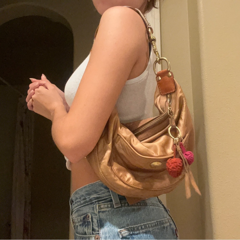 vintage coach gold purse with two suede strawberry poms